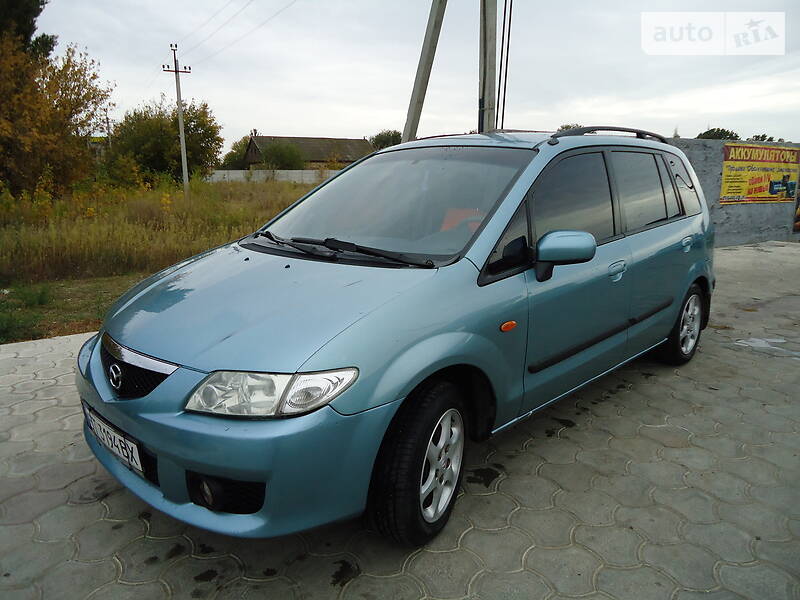 Где находится номер двигателя на автомобиле Mazda Premacy