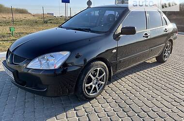 Mitsubishi Lancer Ridna farba gaz 2004