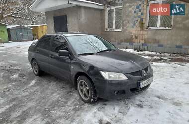 Mitsubishi Lancer  2004