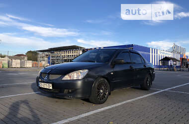 Mitsubishi Lancer  2003