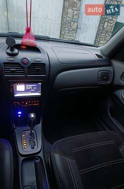Nissan Almera  2006
