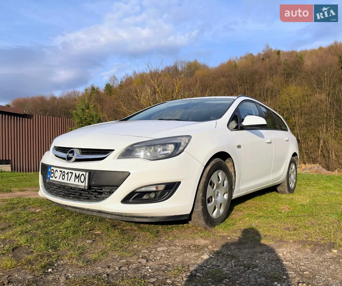 2014 Opel Astra - фото 1