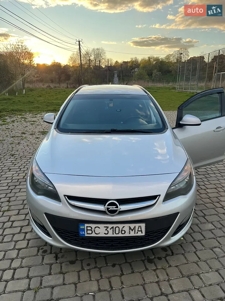 2014 Opel Astra - фото 1