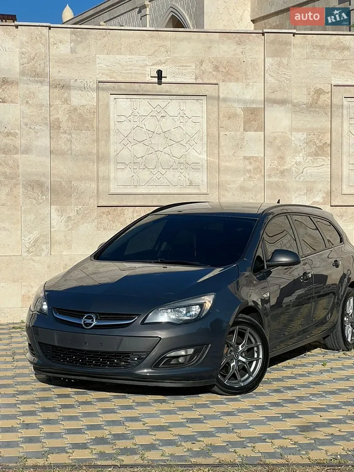 2014 Opel Astra - фото 1
