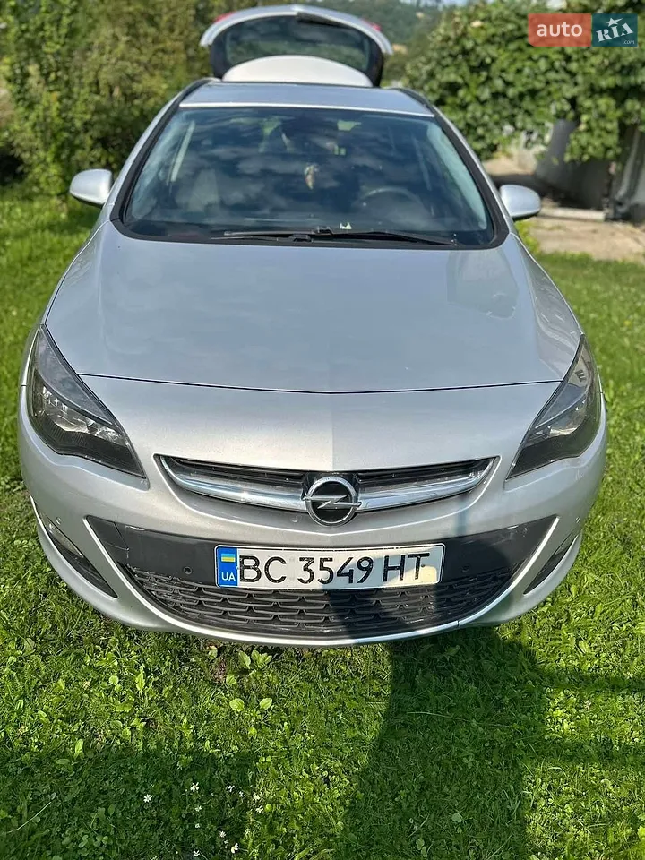 2014 Opel Astra - фото 1