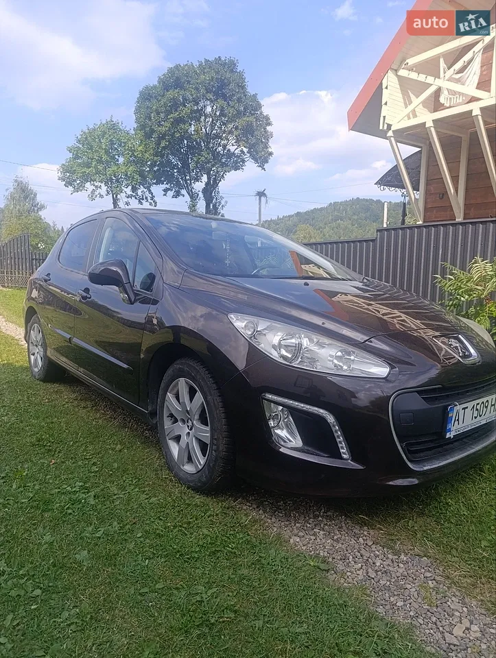2011 Peugeot 308 - фото 1