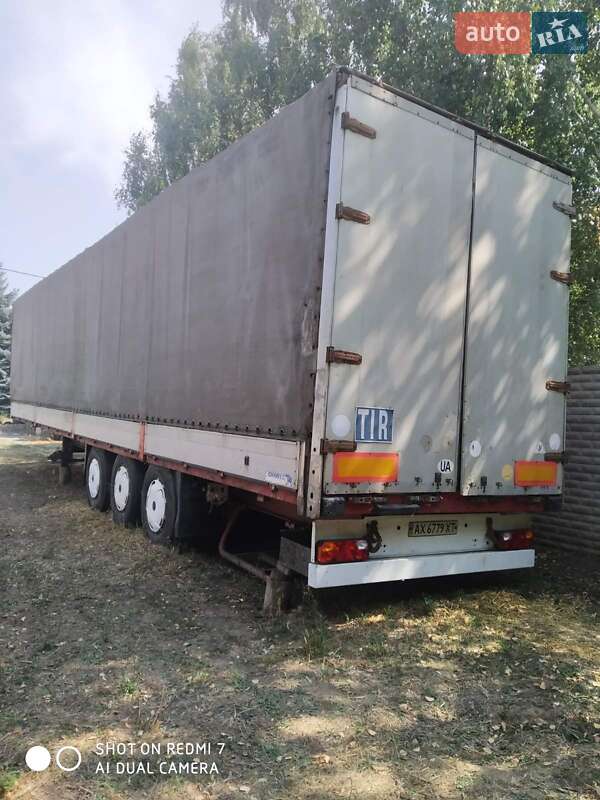 Бортовий напівпричіп Schmitz Cargobull AWF 18