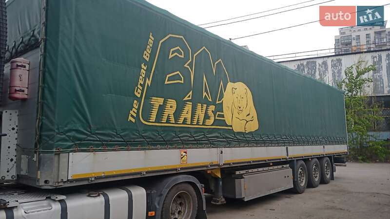 Бортовий напівпричіп Schmitz Cargobull Cargobull