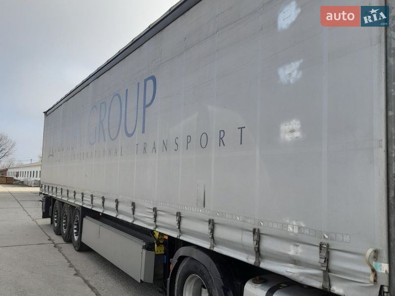 Тентований борт (штора) - напівпричіп Schmitz Cargobull Cargobull