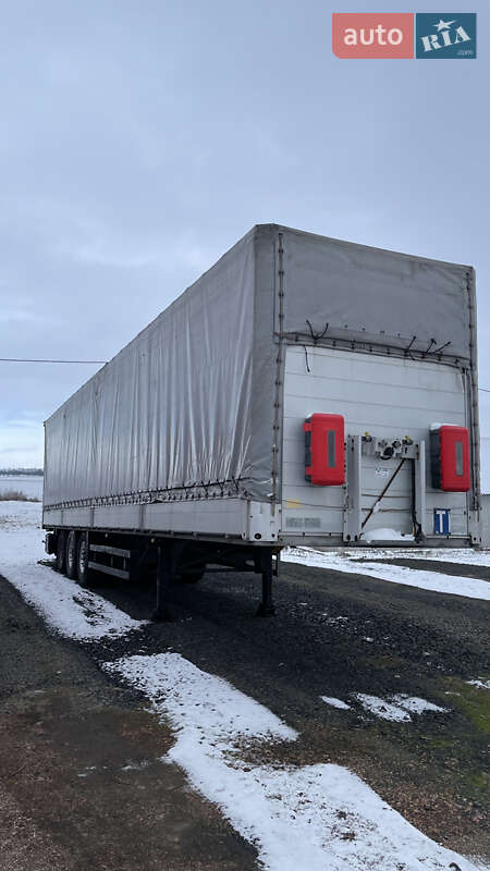 Бортовий напівпричіп Schmitz Cargobull S01