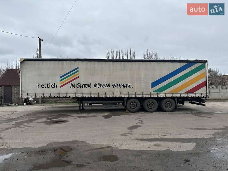 Тентованный борт (штора) - прицеп Schmitz Cargobull S01