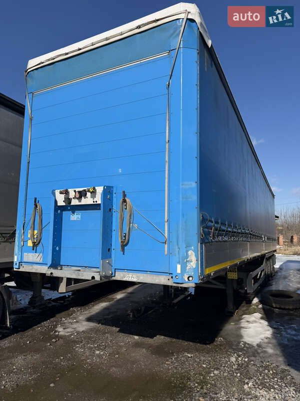 Бортовий напівпричіп Schmitz Cargobull SCS