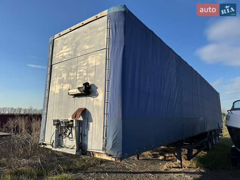 Тентований борт (штора) - напівпричіп Schmitz Cargobull SFG