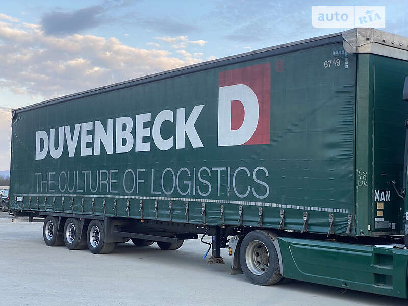 Тентованный борт (штора) - полуприцеп Schmitz S-01