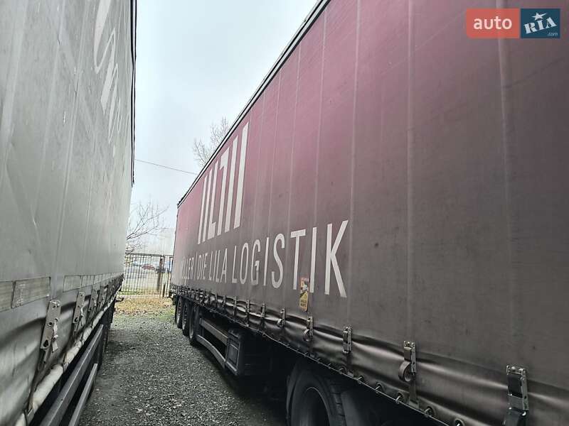 Тентованный борт (штора) - полуприцеп Schmitz S-01