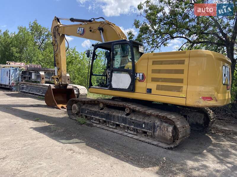 Екскаватор навантажувач