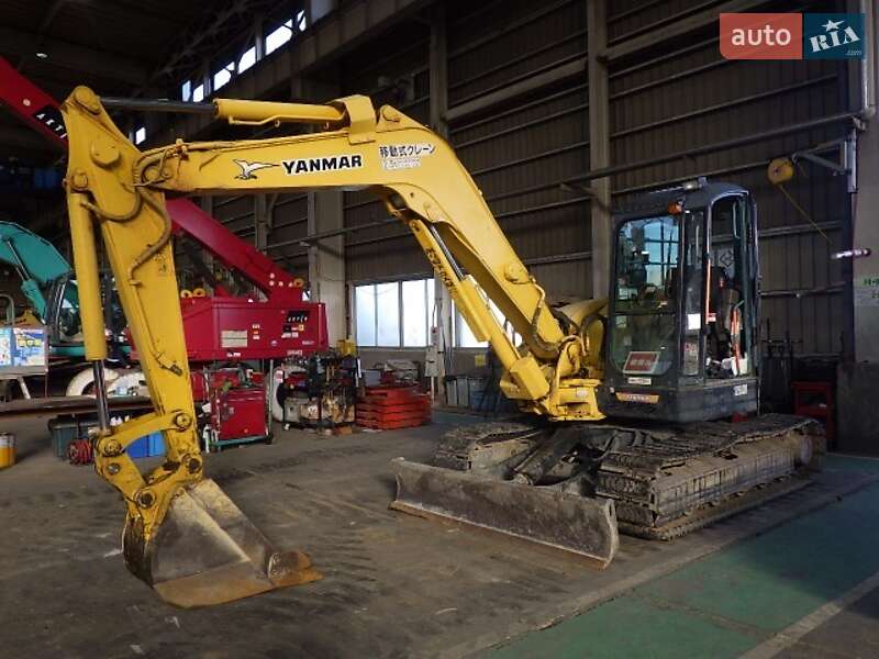 Гусеничний екскаватор