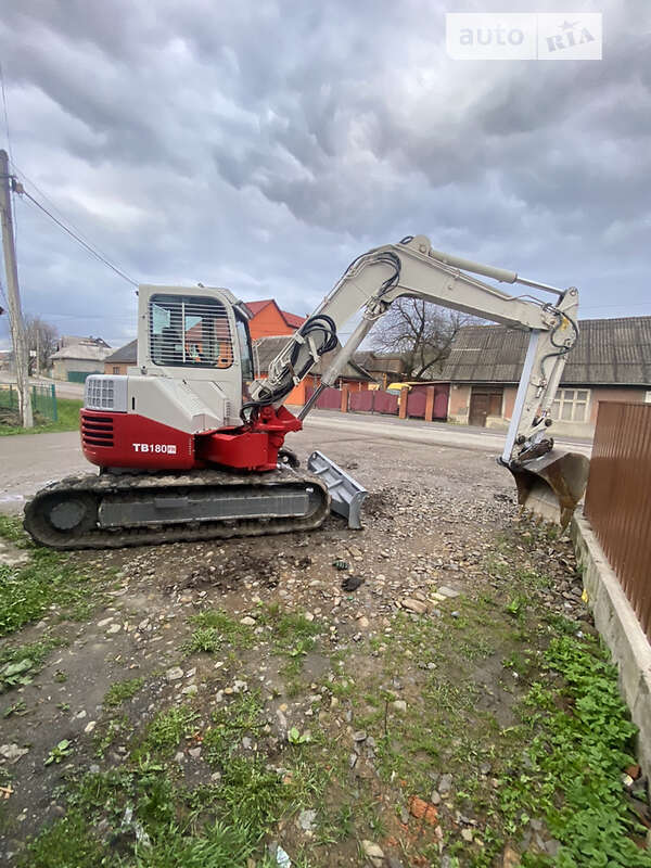 Міні-екскаватор Takeuchi TB