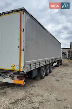 Цены Krone Тентованный борт (штора) - прицеп