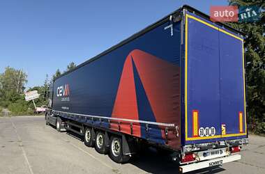 Ціни Schmitz Cargobull Тентований борт (штора) - прицеп