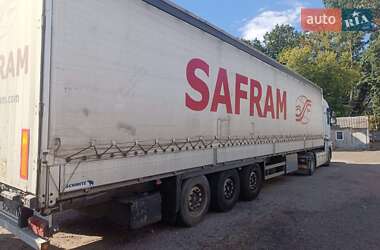 Ціни Schmitz Cargobull Тентований борт (штора) - прицеп