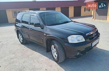 Характеристики Mazda Tribute Позашляховик / Кросовер