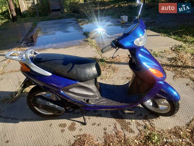 Скутер Yamaha Grand Axis