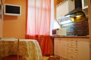 двокімнатна квартира в Києві, на вул. Малопідвальна 21/8 в оренду на короткий термін подобово фото 2