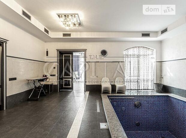 одноэтажный дом с камином, 590 кв. м, кирпич. Сдается помесячно в Буче, в районе Буча фото 1 одноэтажный дом с камином, 590 кв. м, кирпич. Сдается помесячно в Буче, в районе Буча фото 1