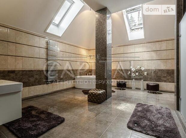 одноэтажный дом с камином, 590 кв. м, кирпич. Сдается помесячно в Буче, в районе Буча фото 1 одноэтажный дом с камином, 590 кв. м, кирпич. Сдается помесячно в Буче, в районе Буча фото 1