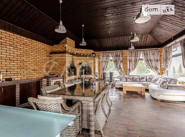 одноэтажный дом с камином, 590 кв. м, кирпич. Сдается помесячно в Буче, в районе Буча фото 1 одноэтажный дом с камином, 590 кв. м, кирпич. Сдается помесячно в Буче, в районе Буча фото 1