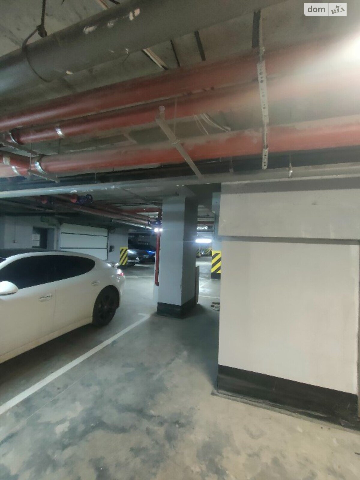 Место на подземном паркинге под легковое авто в Днепре, площадь 19.5 кв.м. фото 1