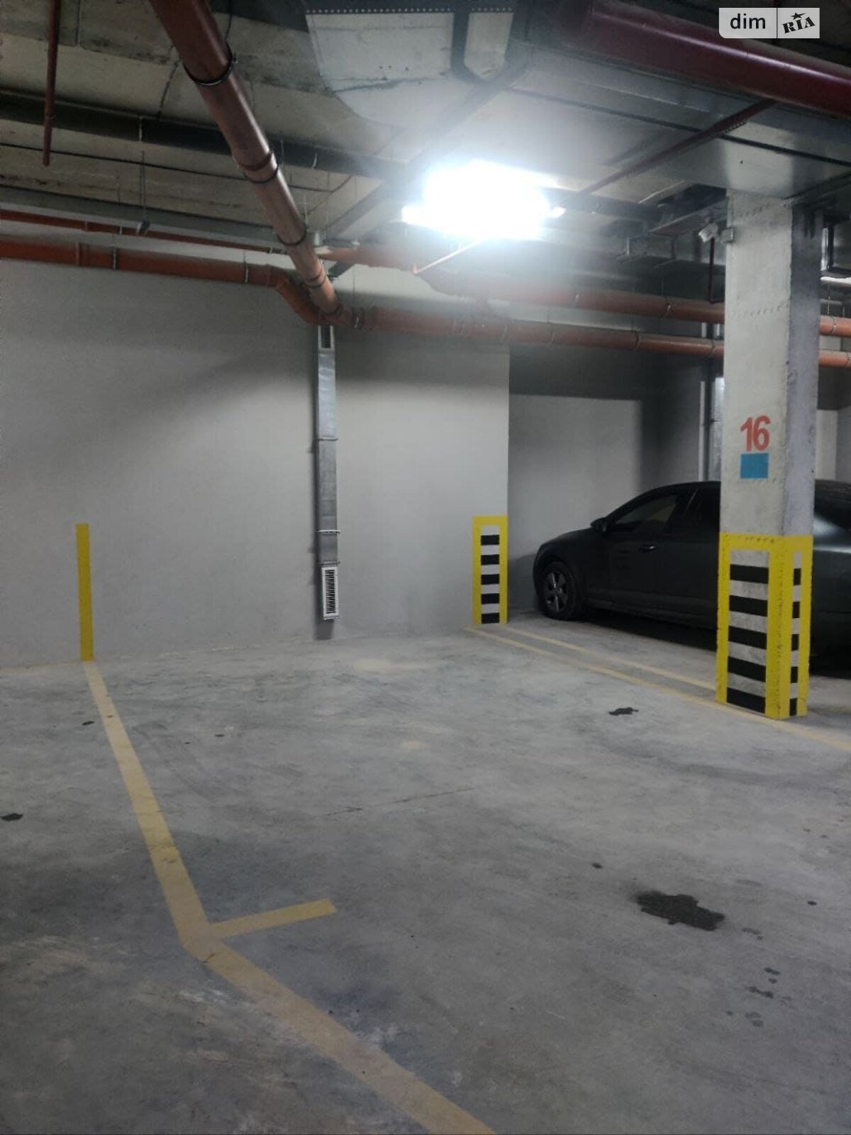 Место на подземном паркинге под легковое авто в Львове, площадь 17 кв.м. фото 1