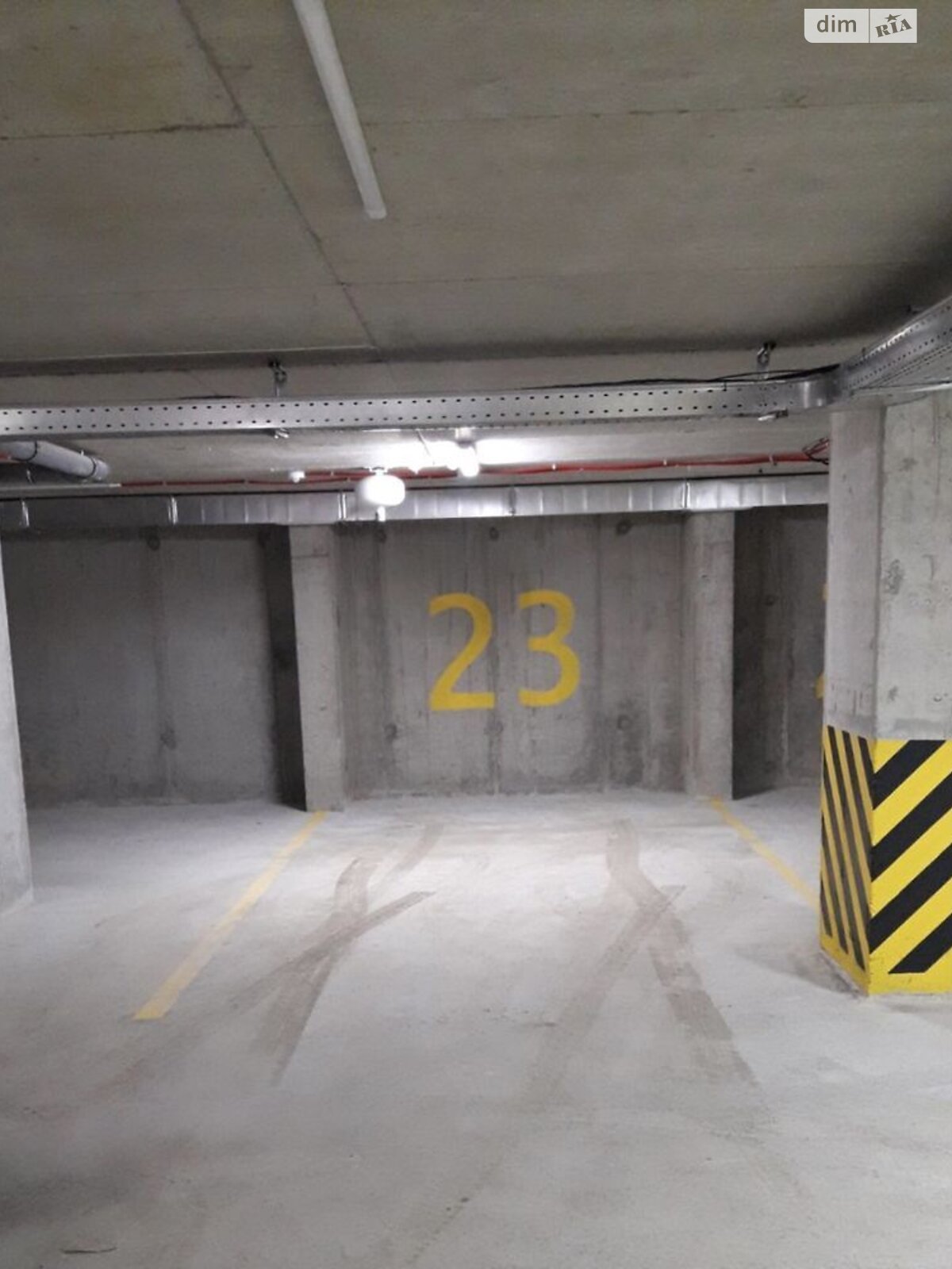 Место на подземном паркинге под легковое авто в Львове, площадь 18 кв.м. фото 1