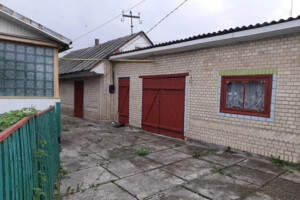 одноэтажный дом с гаражом, 70 кв. м, кирпич. Продажа в Барановке фото 2