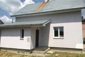 двухэтажный дом с гаражом, 100 кв. м, кирпич. Продажа в Бартатовом фото 2