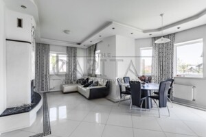 двухэтажный дом с гаражом, 200 кв. м, кирпич. Продажа в Бобрице фото 2