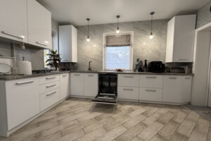 одноэтажный дом с гаражом, 101 кв. м, кирпич. Продажа в Боголюбах фото 2