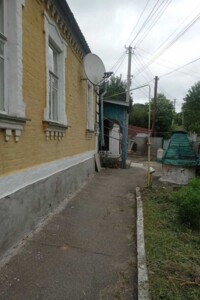 одноэтажный дом с гаражом, 90 кв. м, кирпич. Продажа в Богуславе фото 2