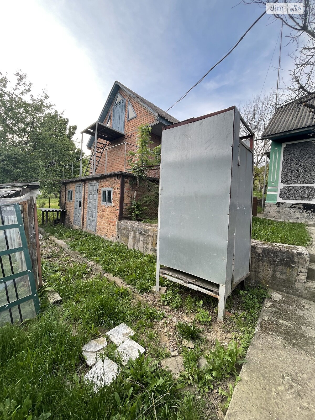 одноэтажный дом с гаражом, 70 кв. м, кирпич. Продажа в Бохониках фото 1