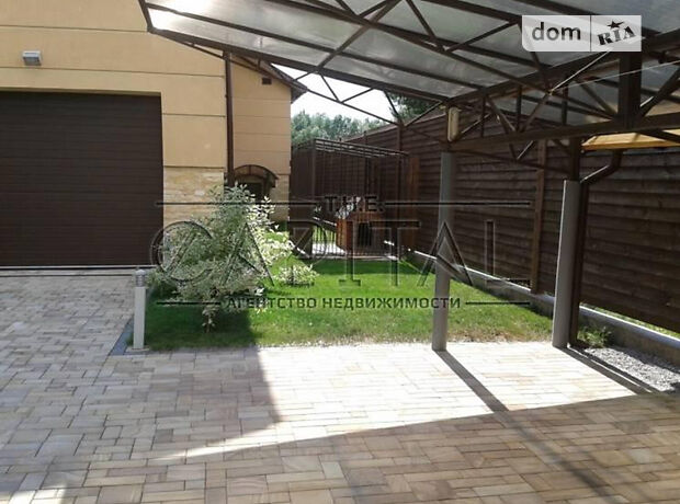 трехэтажный дом с гаражом, 720 кв. м, кирпич. Продажа в Гнедине (Киевская обл.) фото 1 трехэтажный дом с гаражом, 720 кв. м, кирпич. Продажа в Гнедине (Киевская обл.) фото 1