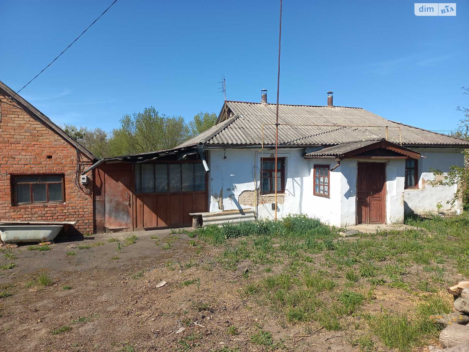 одноэтажный дом с гаражом, 82.2 кв. м, кирпич саманный. Продажа в Брацлаве фото 1 одноэтажный дом с гаражом, 82.2 кв. м, кирпич саманный. Продажа в Брацлаве фото 1