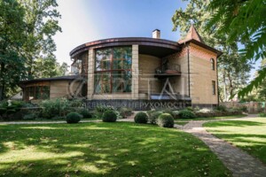 двухэтажный дом с гаражом, 805 кв. м, кирпич. Продажа в Буче район Буча фото 2