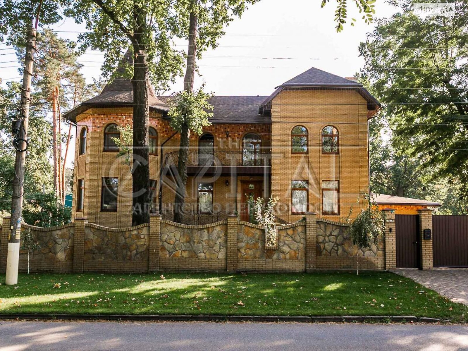 двухэтажный дом с гаражом, 805 кв. м, кирпич. Продажа в Буче район Буча фото 1