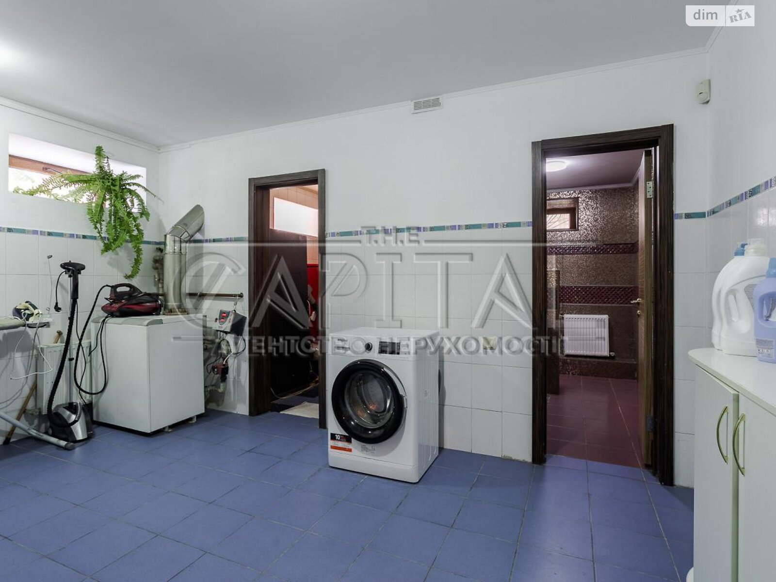 двухэтажный дом с гаражом, 805 кв. м, кирпич. Продажа в Буче район Буча фото 1