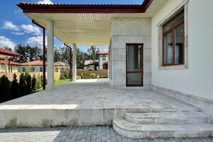 одноэтажный дом с гаражом, 250 кв. м, кирпич. Продажа в Буче район Буча фото 2