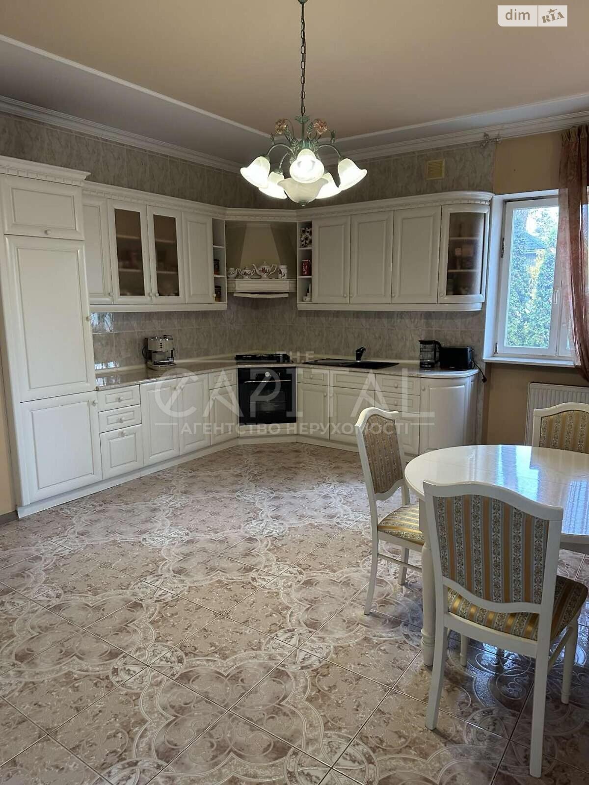 трехэтажный дом с верандой, 428.9 кв. м, кирпич. Продажа в Буче район Буча фото 1