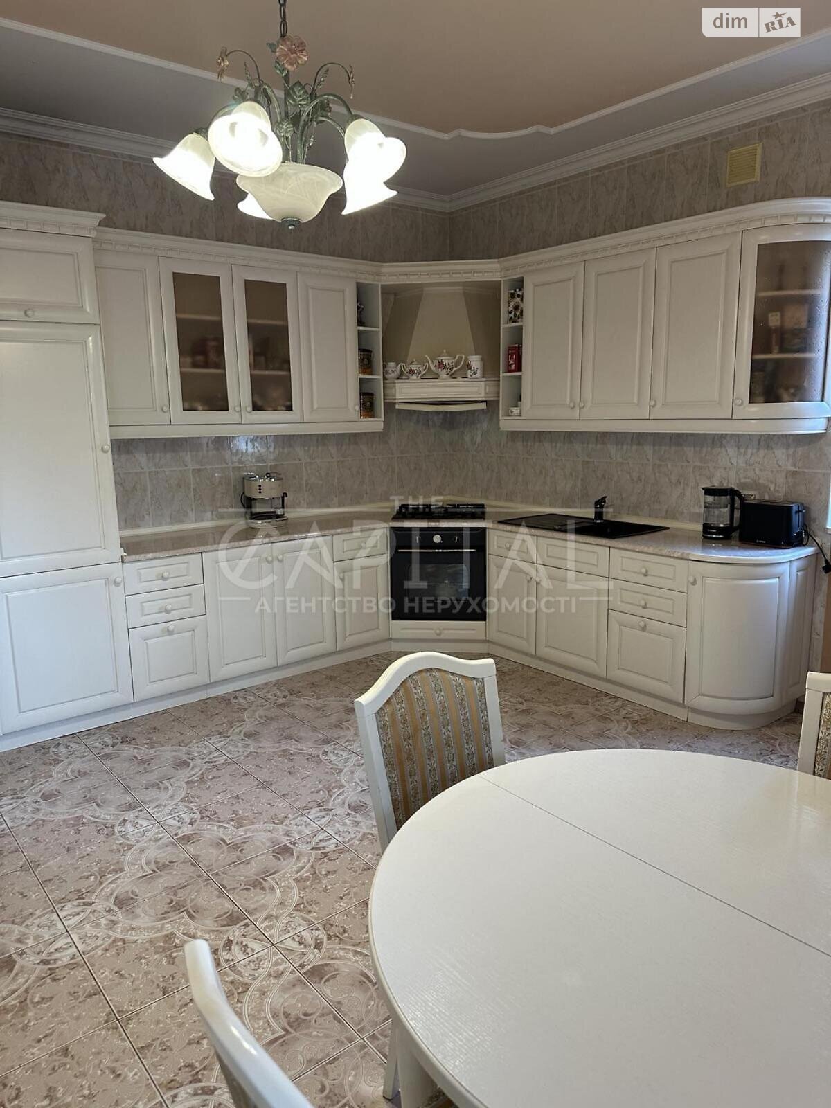 трехэтажный дом с верандой, 428.9 кв. м, кирпич. Продажа в Буче район Буча фото 1