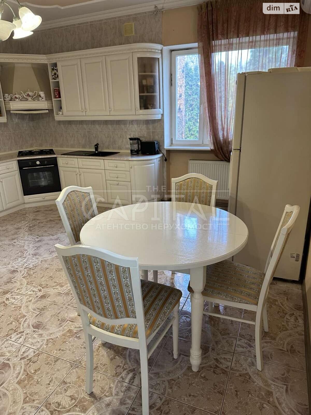 трехэтажный дом с верандой, 428.9 кв. м, кирпич. Продажа в Буче район Буча фото 1