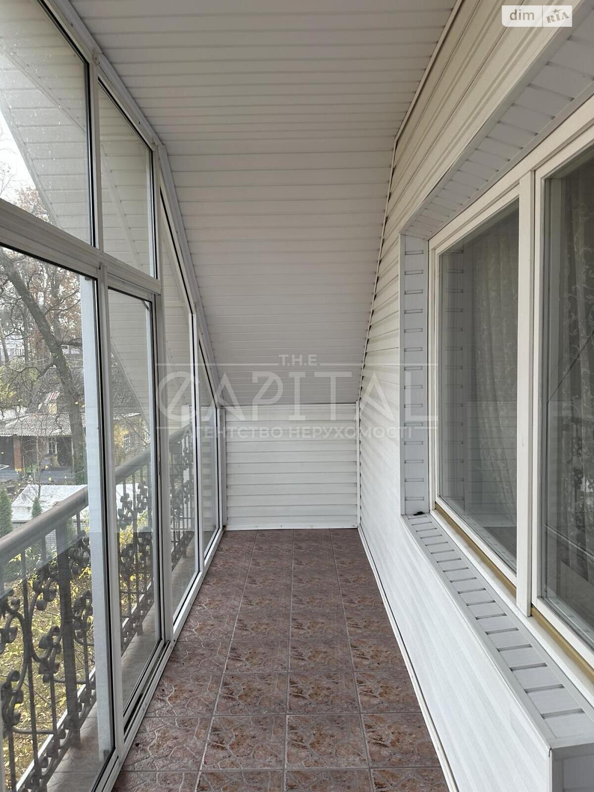 трехэтажный дом с верандой, 428.9 кв. м, кирпич. Продажа в Буче район Буча фото 1